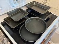 All pans stacked on stove