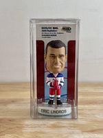 Front view of sealed Eric Lindros bobblehead in packaging