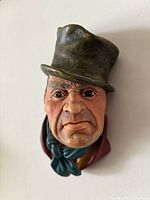 Front view of Bill Sikes chalkware head