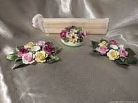 All items: two floral candle holders, one posy ornament, bundle of three beeswax taper candles