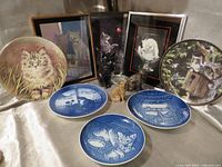 Group shot showing all plates, framed prints and figurines