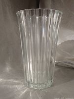 Full view of vase showing flared ribbed design