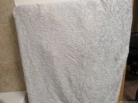 Front view showing embossed swirl velvet pattern