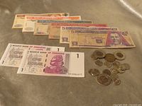 Overall lot showing banknotes and coins