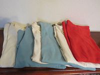 Six folded tops showing color range