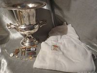 Overall lot showing trophy, sweater, golf accessories
