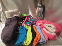 All items displayed including slippers, compression socks box and assorted ankle socks