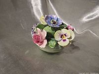 Front view of porcelain floral posy bowl showing multiple coloured flowers