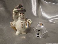 Front view showing both snowmen, Swarovski crystal and Lenox porcelain