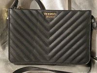 Front view showing chevron quilting and logo