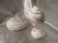Gerold egg trinket box, Avon egg trinket box and floral bud vase grouped together
