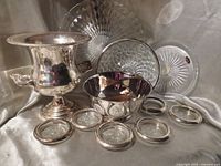 Group view of bucket, bowl, plate, platter and six coasters