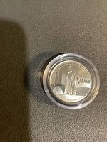 Reverse of 2017 Canada Vimy $3 silver coin in capsule