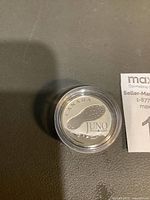 Reverse side with JUNO boot imprint in capsule