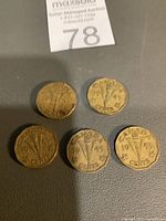 Five 1943 Canadian Victory nickels front side