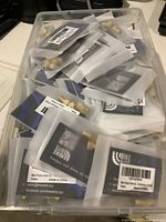 Tray filled with sealed Bike Bits pouches containing adapters and caps