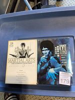 Front view of both DVD box sets in tote