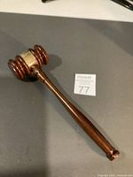 Full view wooden gavel, brass band visible