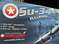 Front of box showing model name Su-34 Fullback and specifications