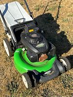 Full view left side of Lawn-Boy mower on grass
