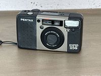 Front view of Pentax Espio 115G showing lens, flash, body condition