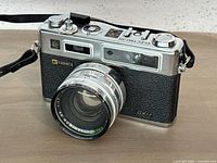 Front view of Yashica Electro 35 camera with Yashinon-DX 45 mm f/1.7 lens attached