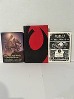 Front view of the three listed YA books standing side by side