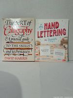 Front covers of both books upright