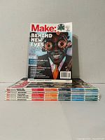 Stack of eight Make magazines with volume 76 front cover visible