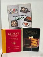 Front view of three hardcover cookbooks