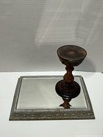 Candle holder and mirrored tray together