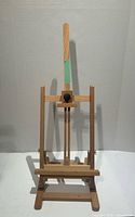 Front view of wooden tabletop easel fully extended