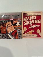 Front covers of both leathercraft instructional books