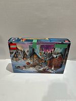 Front angled view of boxed LEGO Harry Potter Advent Calendar with green tape seal