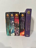 Front view of five Heroes of Olympus books in slipcase