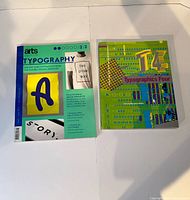Front view of two typography reference books showing covers