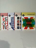 Front covers of Uppercase magazines volumes 25, 26, 27, 52 arranged side by side