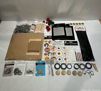 Overview of assorted craft supplies laid out