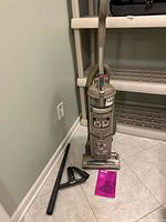 Full view of Shark Navigator vacuum with hose, attachments and manual