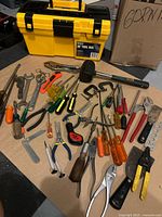 Overall view of tool assortment with toolbox