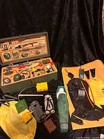 Overall shot of footlocker, tray and loose accessories