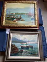 Both paintings in frames