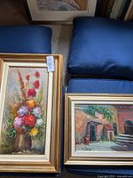 Two framed paintings side by side showing size and frame style