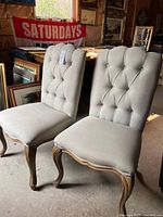 Two upholstered accent chairs front view