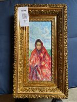 Full view of framed oil painting