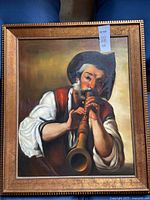 Full view of framed painting showing subject and frame