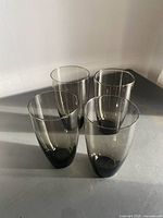 Set of four smoke highball glasses upright