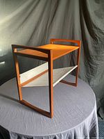 Overall view showing teak frame and canvas sling