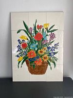 Front view showing full mosaic of flower basket on twelve tiles