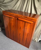 Closed rosewood dresser front view